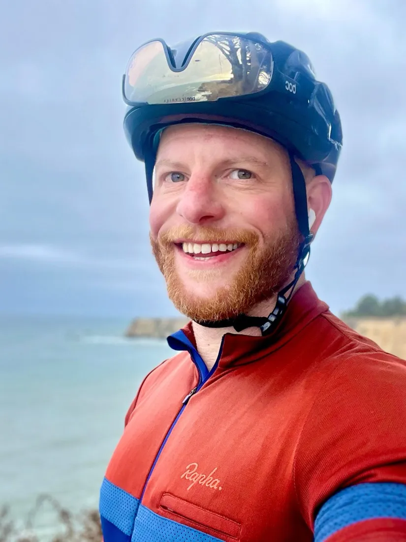 Corey cycling on the coast